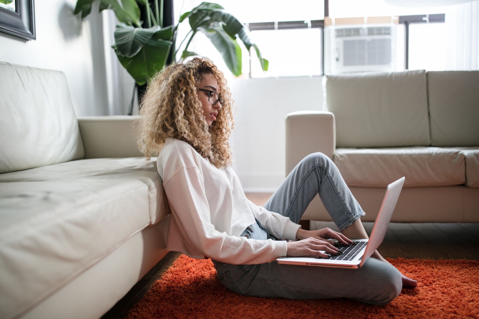 A person on a video call, engaged in an online therapy session